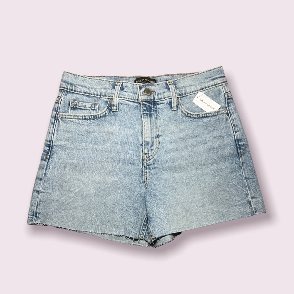 high rise shorts, straight from hip to thigh. Size 26 petite. Light wash color.